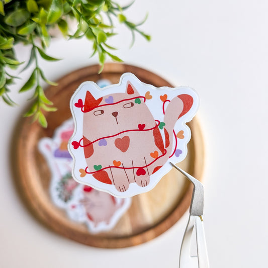 Sticker – Chat dans sa guirlande de cœurs